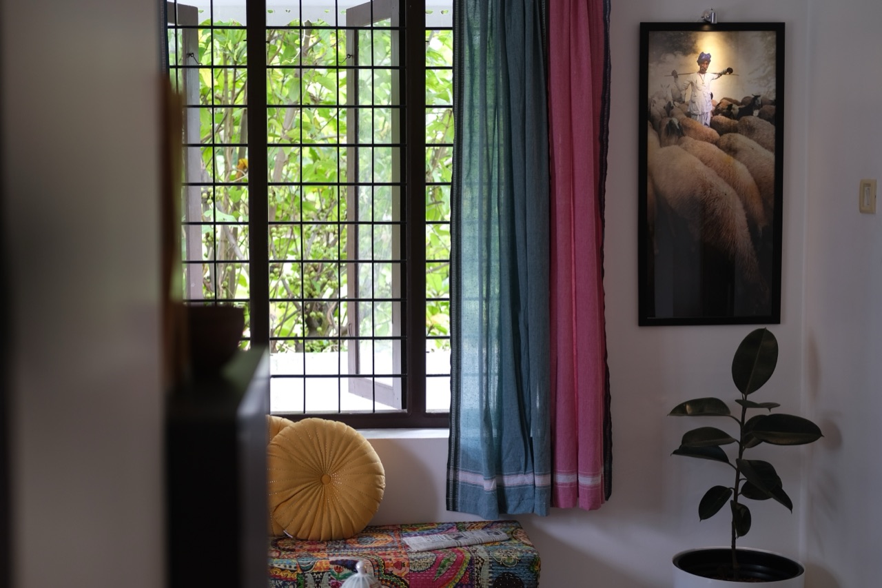 Yellow Postbox exterior at golden hour